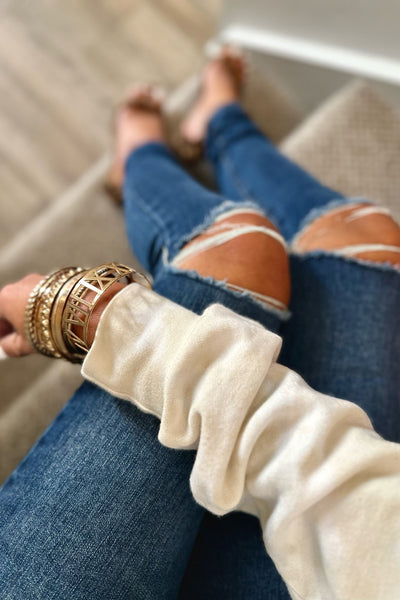 Indigo Distressed Denim Jeg Jeans - Women's